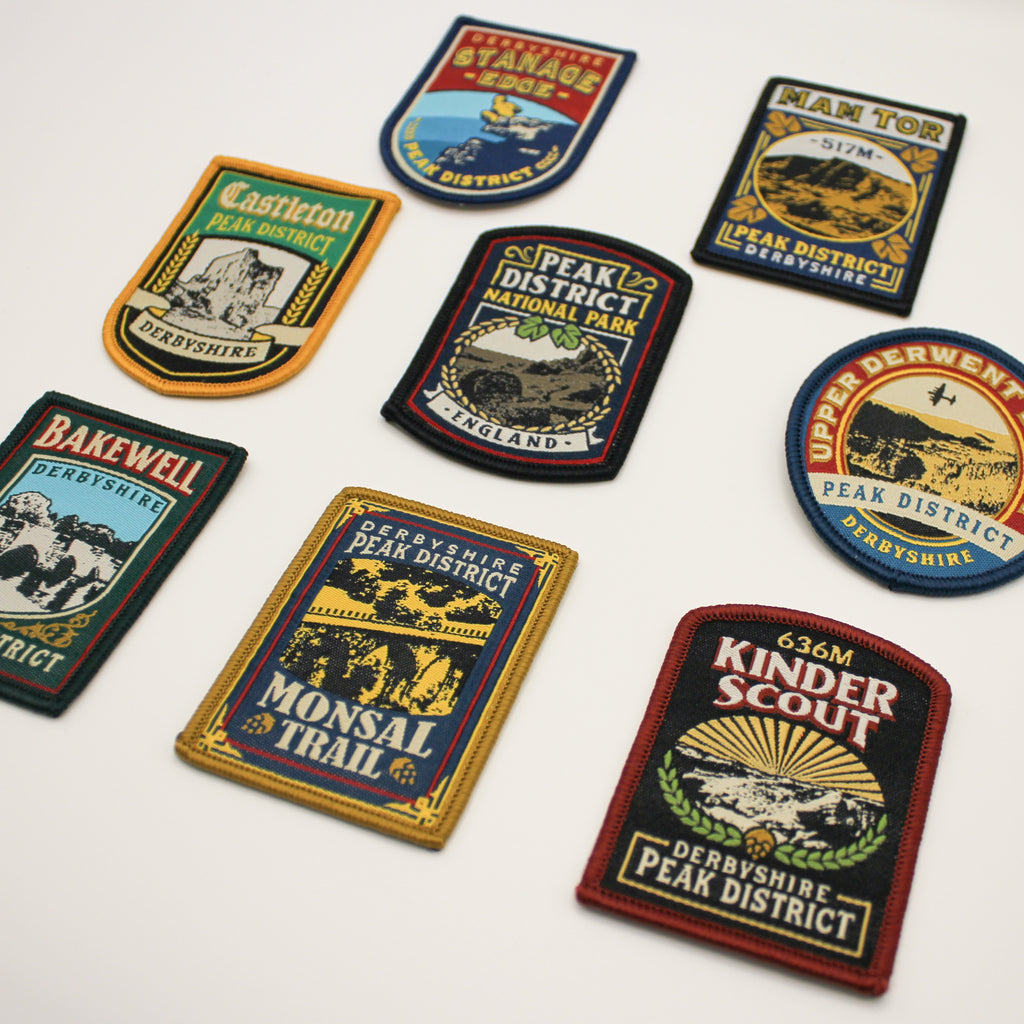 Collection of Peak District-themed patches on a white background